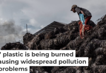 Workers prepare to burn imported plastic waste at a dump in East Java, Indonesia, in 2018. Ulet Ifansasti/Getty Images